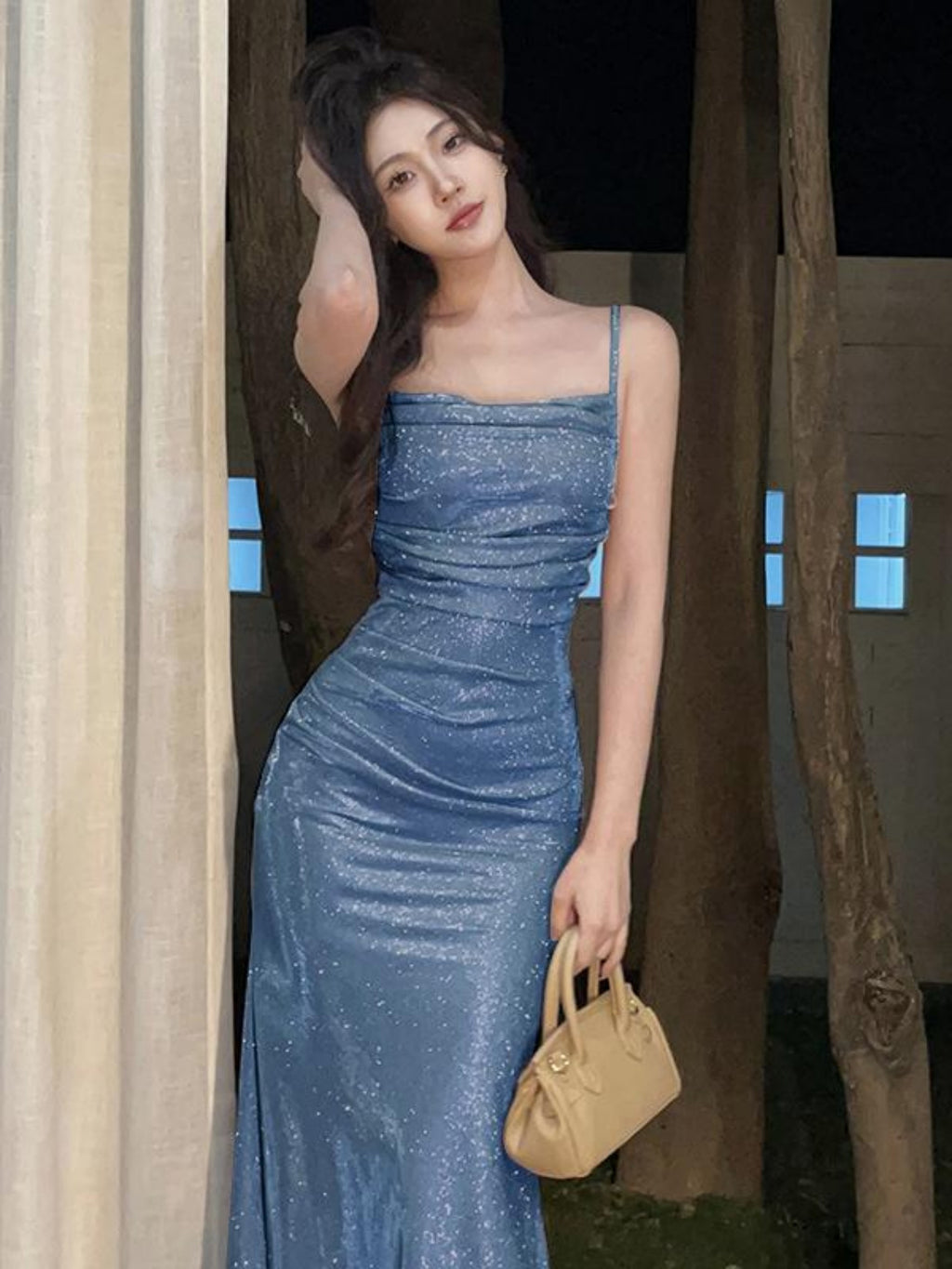 A Glamorous And Form-Fitting Party Dress for Women.